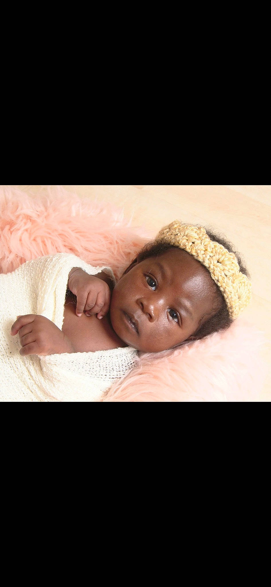 Dionnie joined the competition — help win amazing prizes! baby, brown, cheek, child, close_up, eye, face, hair_accessory, head, headgear, human, lip, nose, person, photograph, photography, portrait, portrait_photography, skin, smile