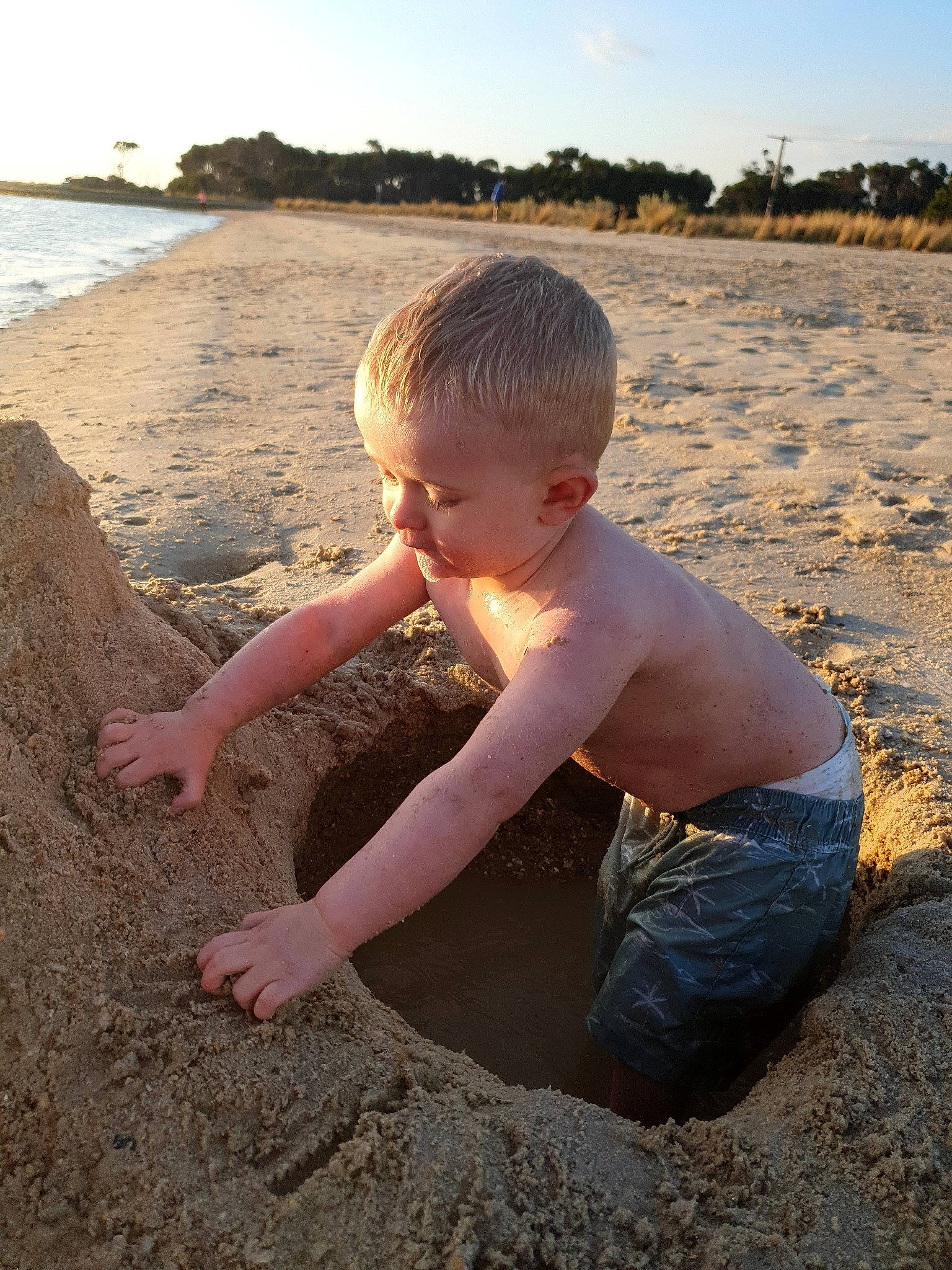 Brooklyn joined the competition — help win amazing prizes! barefoot, beach, coast, flash_photography, fun, hand, happy, horizon, leisure, people_in_nature, people_on_beach, person, sand, shore, sitting, sky, soil, summer, toddler, water