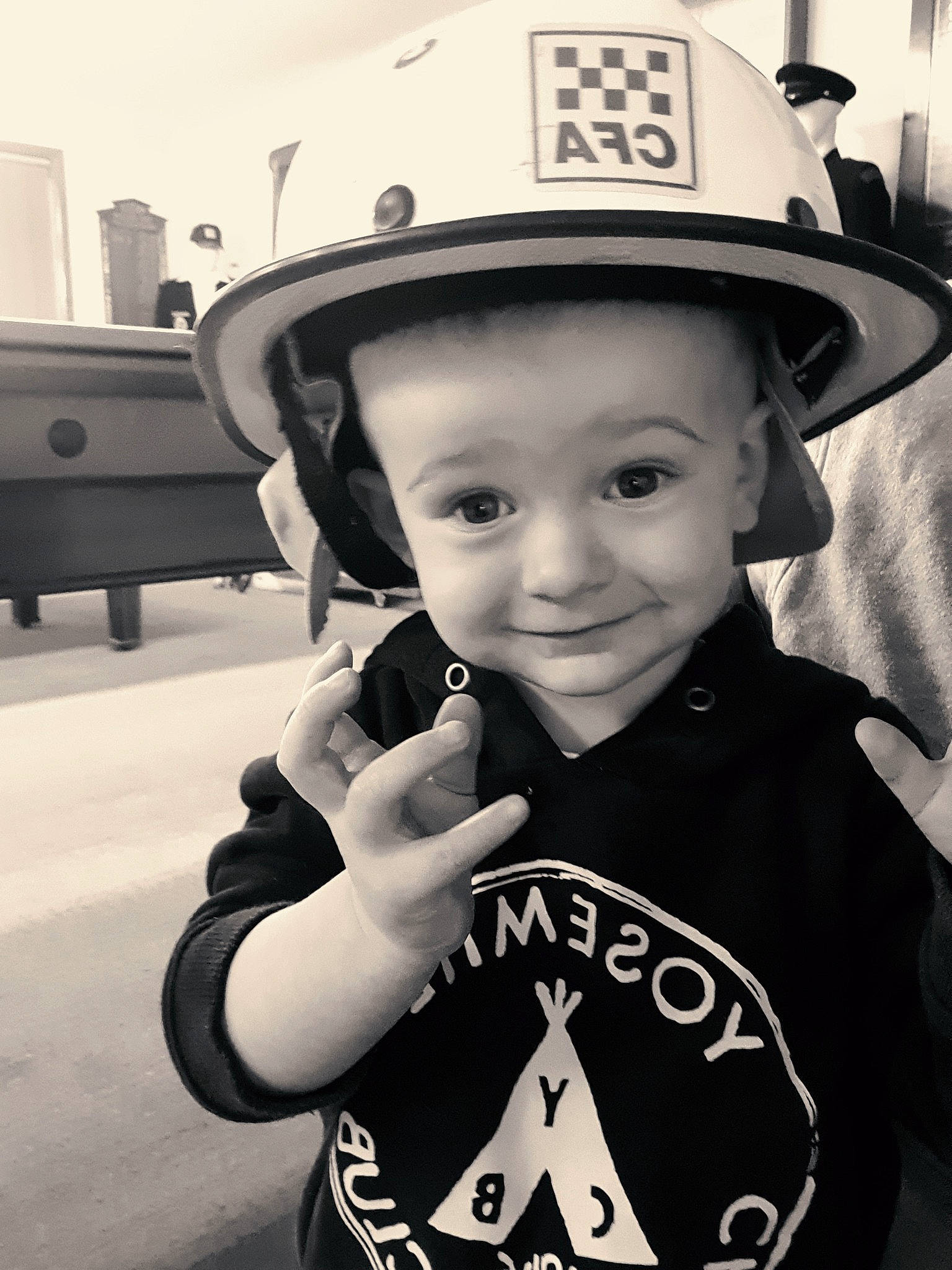 Brooklyn joined the competition — help win amazing prizes! black, black_and_white, cool, eye, flash_photography, happy, hat, headgear, helmet, joy, monochrome, people, person, personal_protective_equipment, photograph, sleeve, smile, standing, style, sun_hat