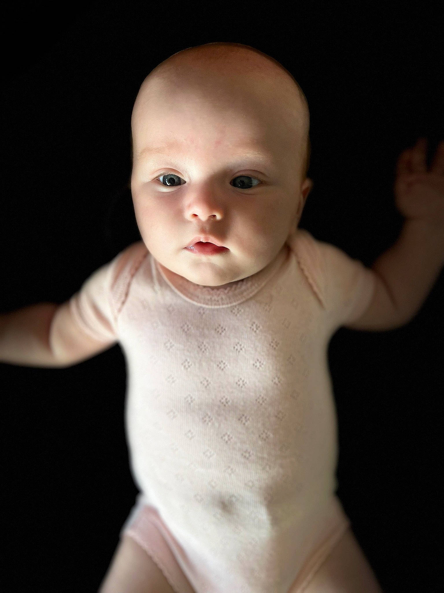 Vienna is registered to the contest to win money with this photo: abdomen, baby, baby_toddler_clothing, cheek, chest, eye, eyebrow, flash_photography, gesture, happy, human_body, iris, lip, neck, no_expression, nose, person, sleeve, stomach, toddler