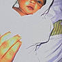 Stormi is registered to the contest to win money with this photo: baby, towel, hand, face, eyes, person, bed, blanket, skin, fingers, infant, soft, wrapped, indoor, lying_down, newborn, curious, closeup, human, comfort