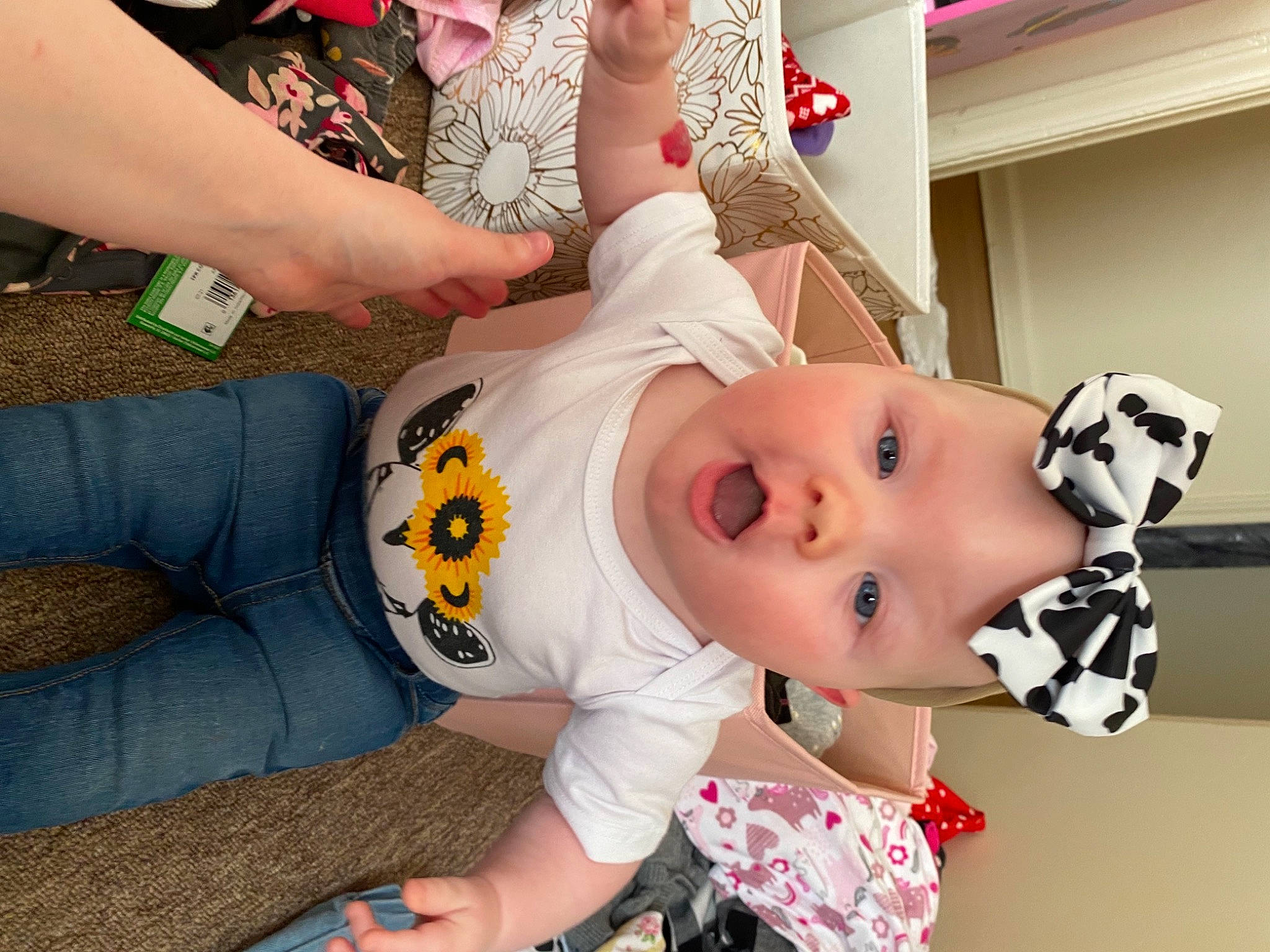 Maci joined the competition — help win amazing prizes! baby, baby_toddler_clothing, carmine, child, comfort, eyelash, finger, fun, hand, happy, hat, head, headwear, human_leg, pattern, person, room, sleeve, surprise, t_shirt