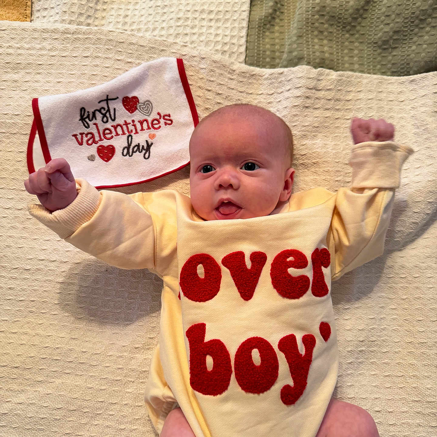 Ashton joined the competition — help win amazing prizes! baby, bed, bib, blanket, bodypart, clothing, cushion, face, finger, furniture, hand, hat, head, homedecor, newborn, pattern, person, photography, portrait, t_shirt