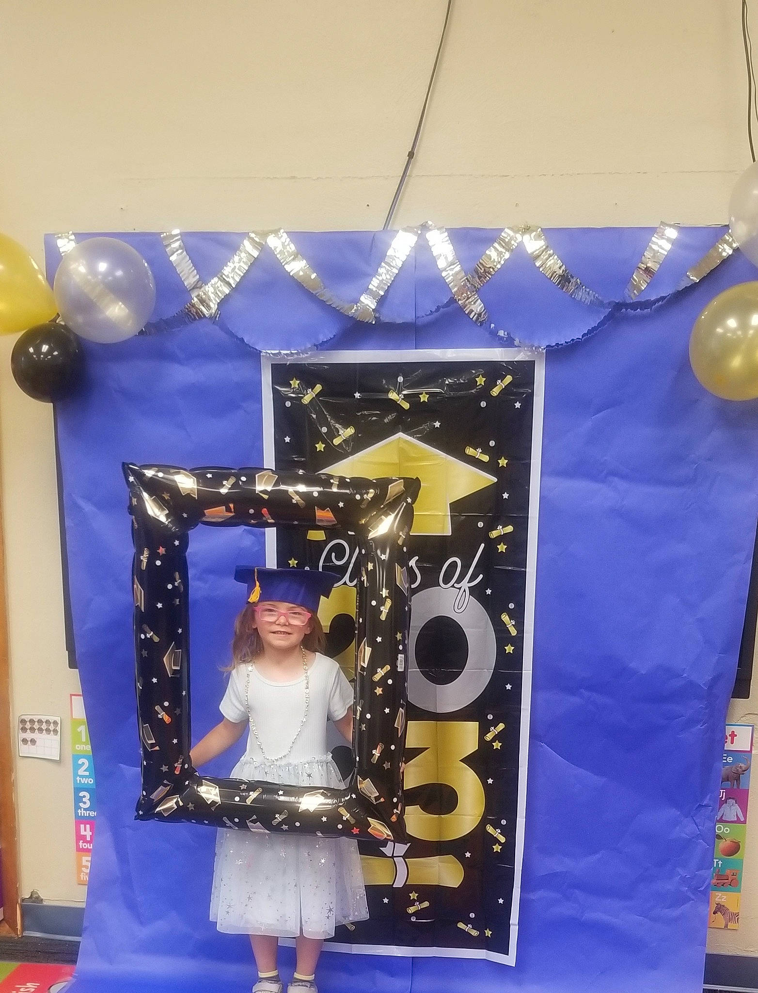 Lucy joined the competition — help win amazing prizes! advertising, art, banner, blue, decoration, electric_blue, event, fashion_design, flooring, fun, headwear, joy, magenta, pattern, person, purple, room, t_shirt, textile, toddler