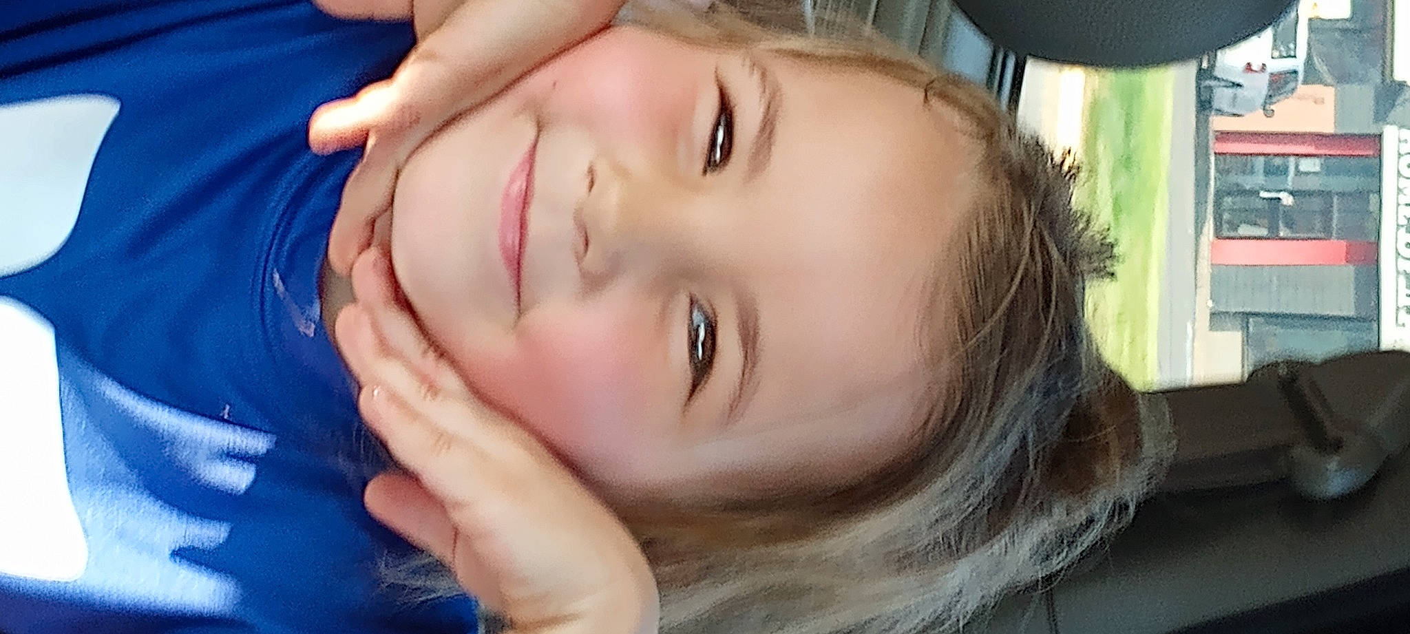 Elizabeth is registered to the contest to win money with this photo: black_hair, cheek, dress, ear, eyebrow, eyelash, facial_expression, forehead, gesture, happy, head, human_body, jaw, joy, lip, mouth, neck, nose, person, plant