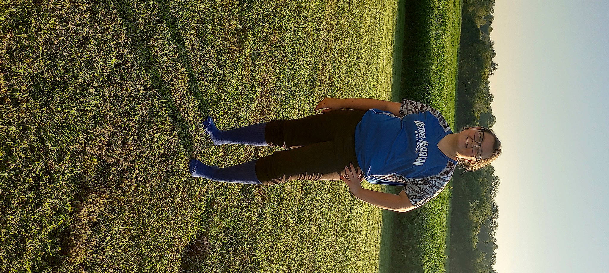 Olivia is registered to the contest to win money with this photo: azure, denim, elbow, electric_blue, fun, grass, grass_family, hand, happy, human_body, human_leg, joy, knee, leg, leisure, nature, people_in_nature, person, plant, recreation