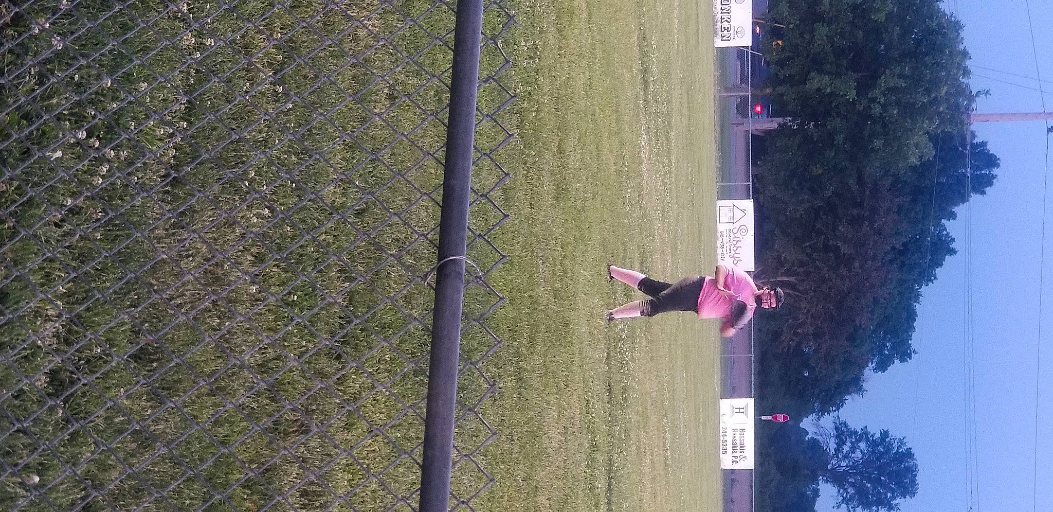 Olivia is registered to the contest to win money with this photo: adventure, asphalt, concrete, extreme_sport, facade, fun, grass, leisure, magenta, person, plant, recreation, reflection, shadow, sidewalk, sport_climbing, tints_and_shades, tree, window