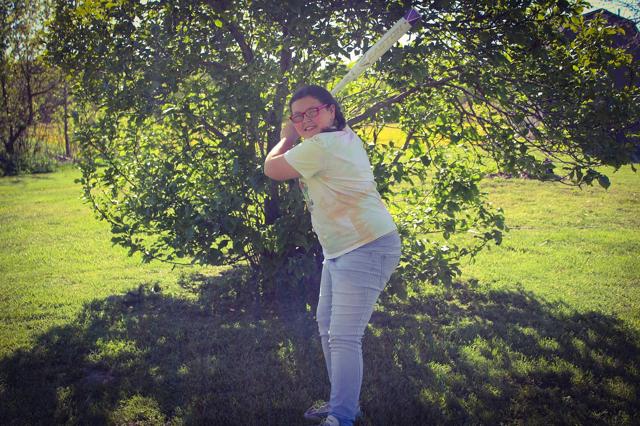 Olivia is registered to the contest to win money with this photo: backlighting, branch, flash_photography, forest, fun, gesture, grass, grassland, happy, joy, landscape, leisure, meadow, natural_landscape, pasture, people_in_nature, person, plant, recreation, tints_and_shades