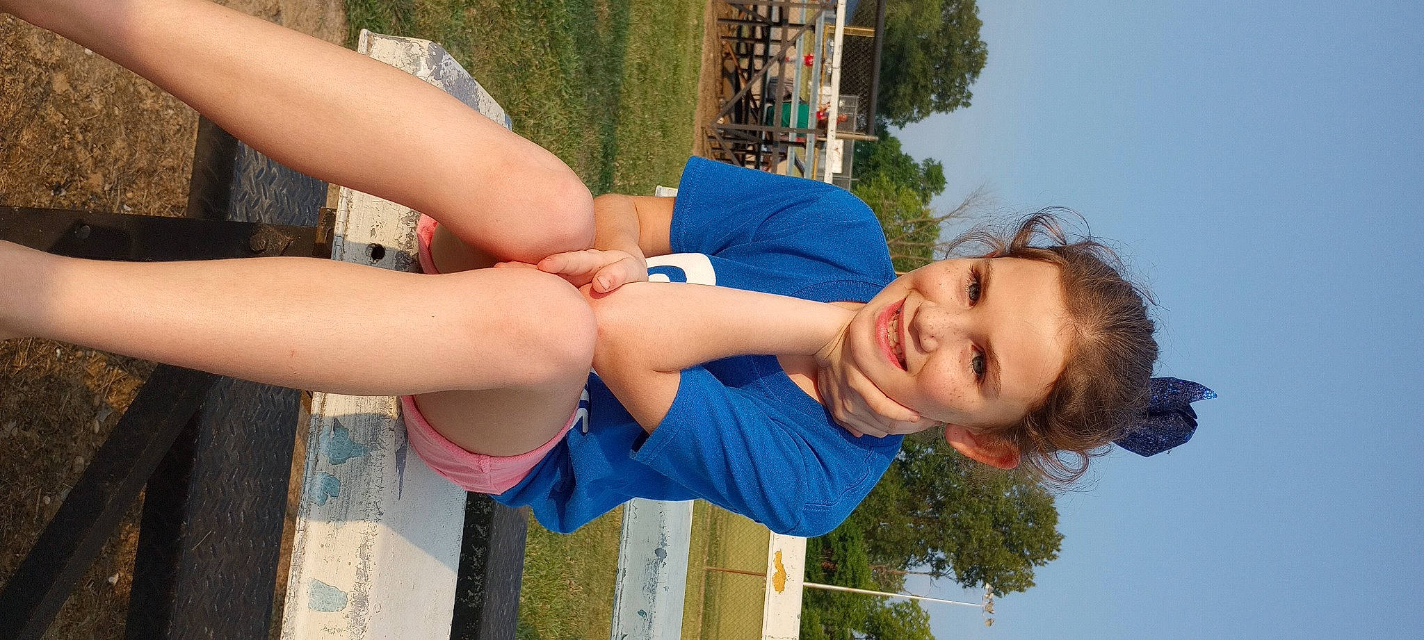 Emma joined the competition — help win amazing prizes! azure, daytime, elbow, electric_blue, fun, gesture, happy, human_leg, joint, joy, knee, leisure, people, people_in_nature, person, plant, recreation, shorts, sky, smile