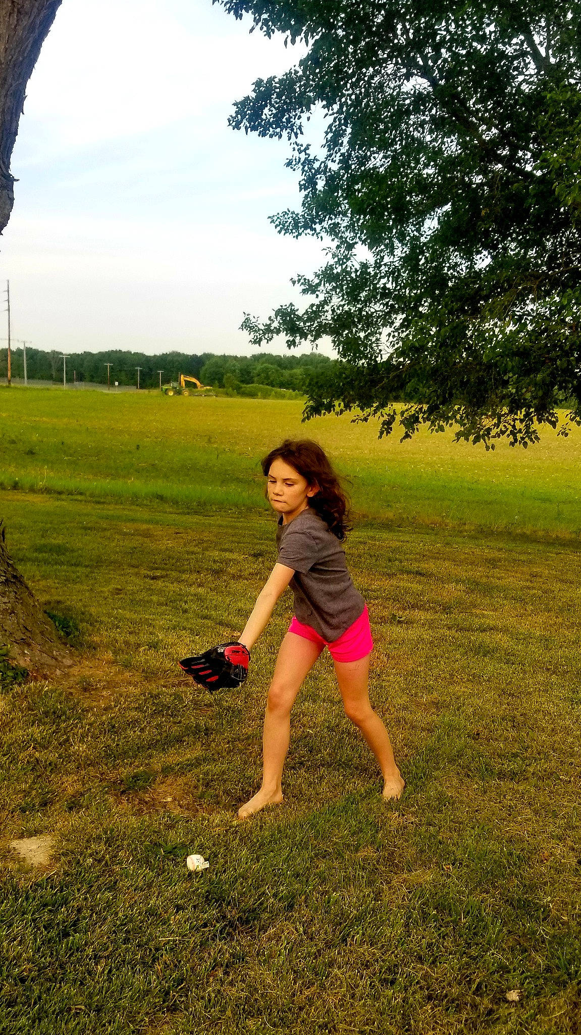 Emma is registered to the contest to win money with this photo: ball, flash_photography, grass, grassland, happy, landscape, lawn, leaf, leisure, meadow, nature, people_in_nature, person, plant, recreation, sky, summer, sunlight, tints_and_shades, tree