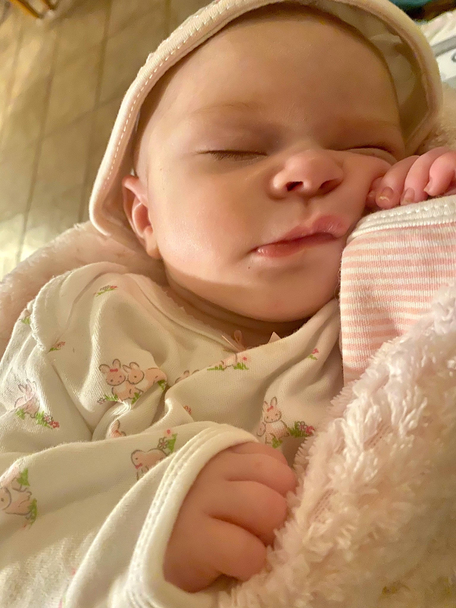 Joanna is registered to the contest to win money with this photo: baby, baby_toddler_clothing, cheek, chin, comfort, eye, eyebrow, finger, gesture, head, iris, lip, mouth, neck, nose, person, pink, skin, sleeve, textile