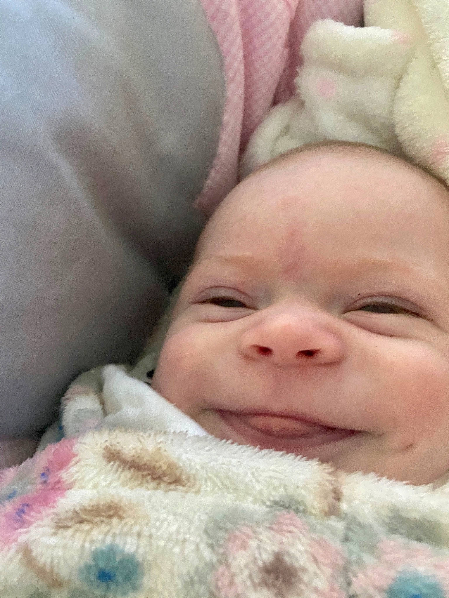 Joanna is registered to the contest to win money with this photo: baby, cheek, child, chin, comfort, eye, eyebrow, face, happy, head, iris, lip, mammal, nose, person, pink, skin, smile, textile, toddler