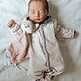 adorable, baby, baby_clothes, blanket, child, comfort, cozy, cute, indoor, infant, newborn, peaceful, pink_onesie, plush_toy, portrait, resting, sleep, sleeping, soft, young_child