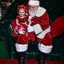 Ivory is registered to the contest to win money with this photo: child, girl, santa_claus, christmas_tree, holiday, red_dress, bow, glasses, beard, white_gloves, boots, couch, ornaments, festive, smile, decorations, indoor, happy, celebration, portrait