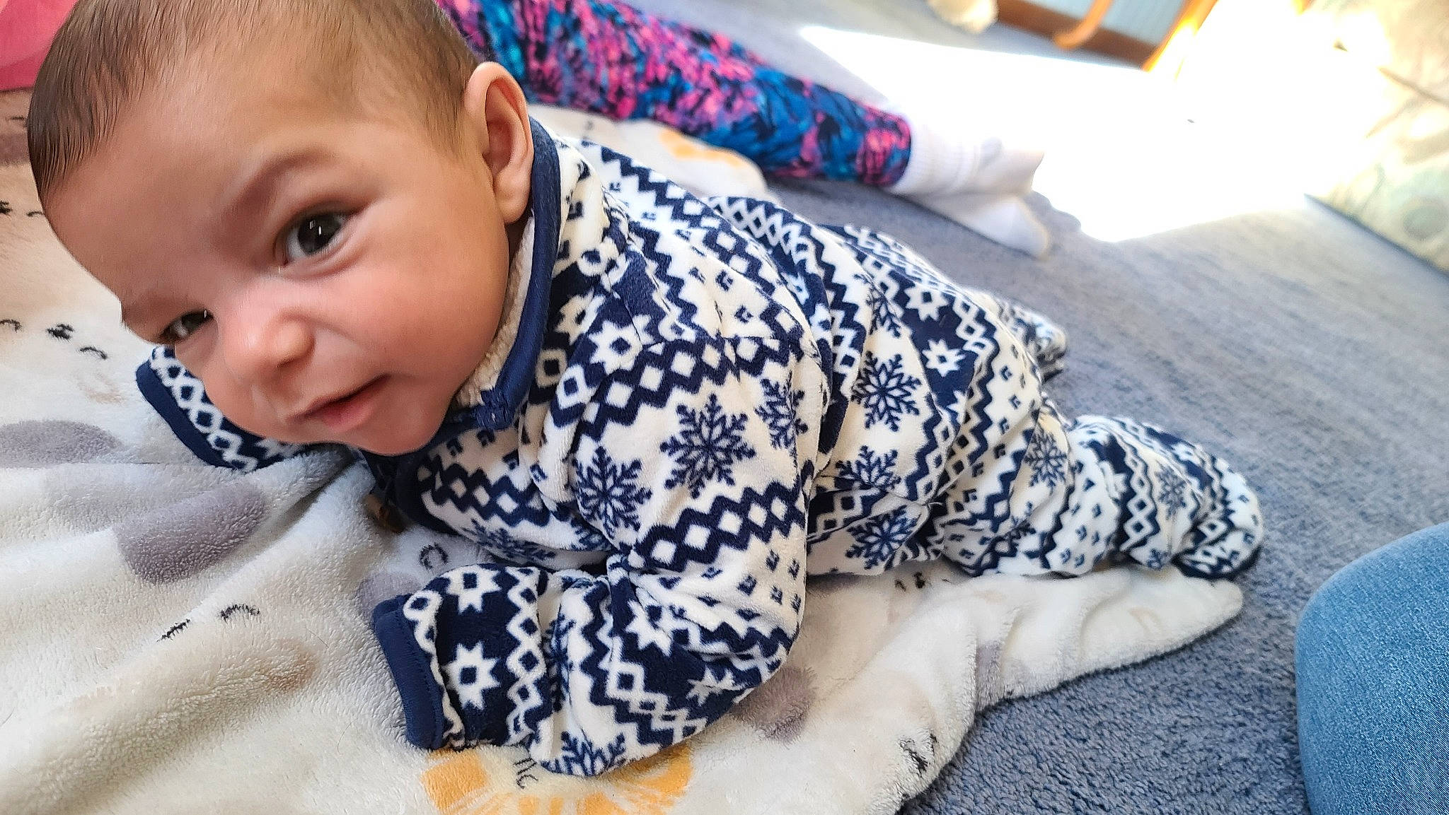 Dominick joined the competition — help win amazing prizes! baby, baby_toddler_clothing, bedding, carpet, child, comfort, crawling, floor, flooring, grey, happy, head, linens, pattern, person, sitting, sleeve, smile, toddler, tummy_time
