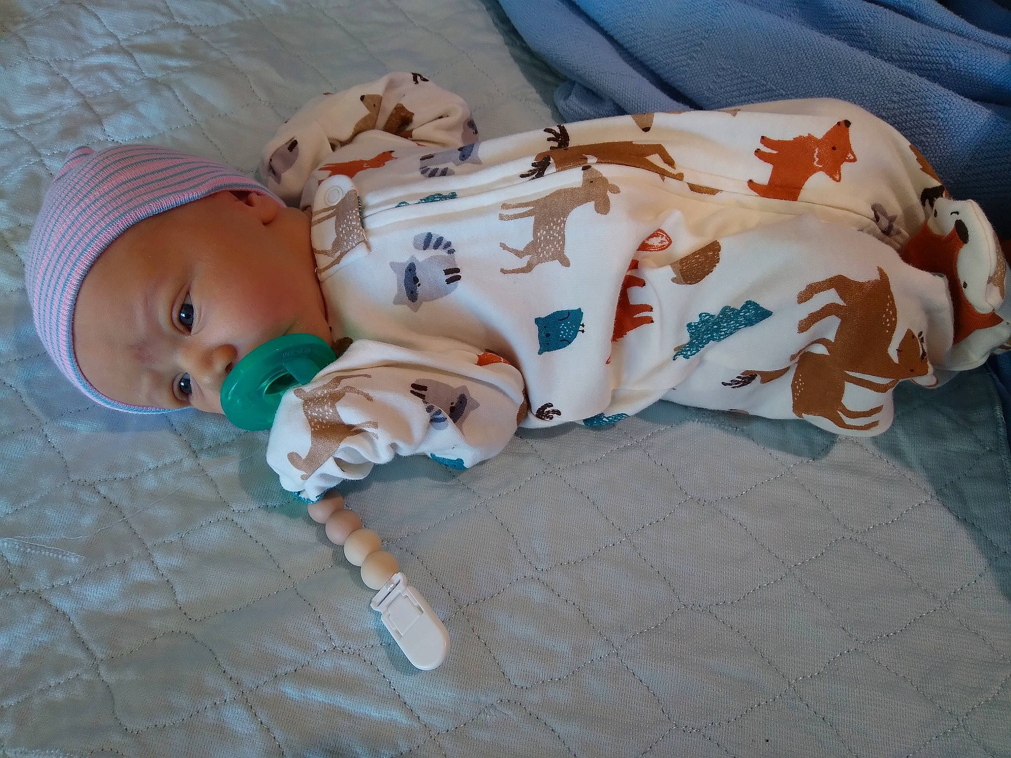 Kyzer is registered to the contest to win money with this photo: baby, baby_products, baby_toddler_clothing, bedtime, child, comfort, hat, linens, nap, pattern, person, room, sitting, sleep, toddler, toy