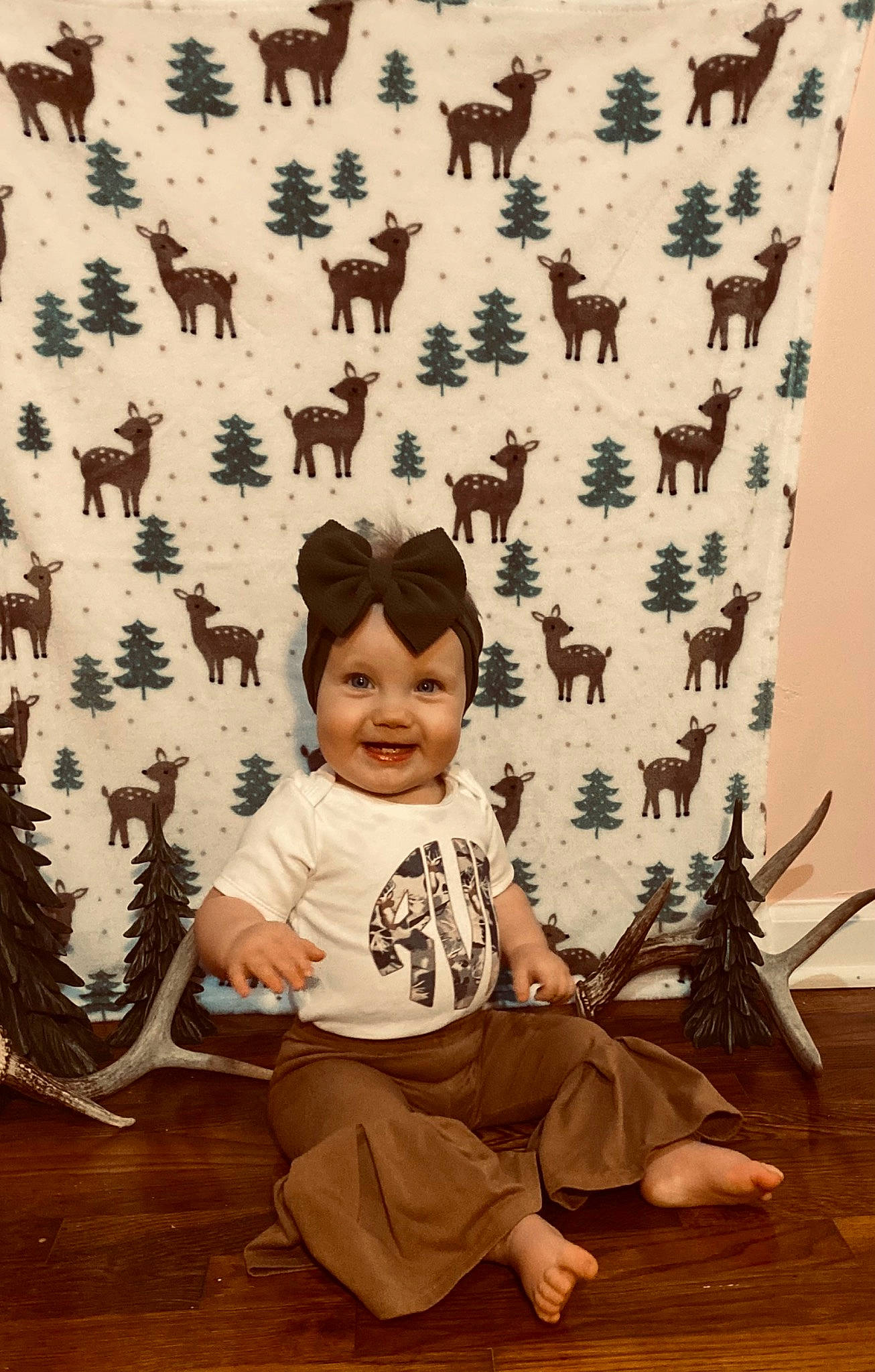 Raelynn joined the competition — help win amazing prizes! art, baby_toddler_clothing, child, door, flooring, happy, hardwood, joy, leaf, pattern, people, person, room, sitting, sleeve, smile, t_shirt, textile, toddler, visual_arts