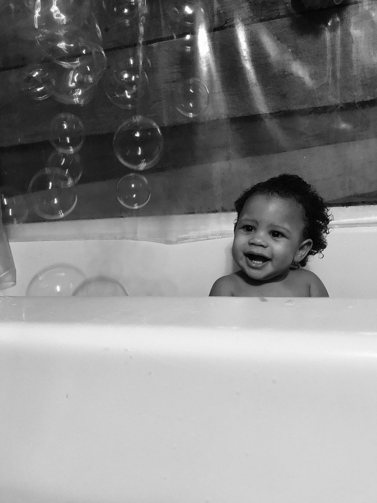 Kamiya joined the competition — help win amazing prizes! black, black_and_white, child, emotion, eye, facial_expression, fun, girl, human, monochrome, monochrome_photography, person, photograph, photography, smile, snapshot, standing, water, white