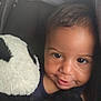 Adam participe au concours pour gagner de l'argent avec cette photo : baby, child, smiling, face, plush_toy, panda, soft_toy, cuddling, cozy, portrait, cute, infant, dark_background, close_up, happy, young_child, indoors, person, expression, toy