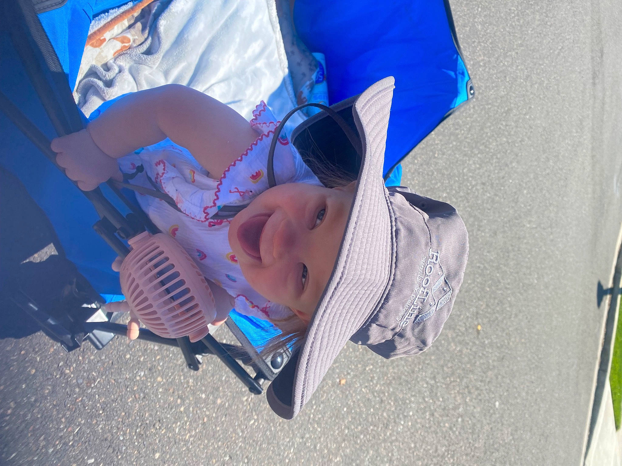 Mariah joined the competition — help win amazing prizes! baby_carriage, baby_products, blue, electric_blue, eyewear, fashion_accessory, fun, hat, headwear, human_leg, leisure, person, personal_protective_equipment, plant, recreation, sun_hat, sunglasses, toddler, tree, water