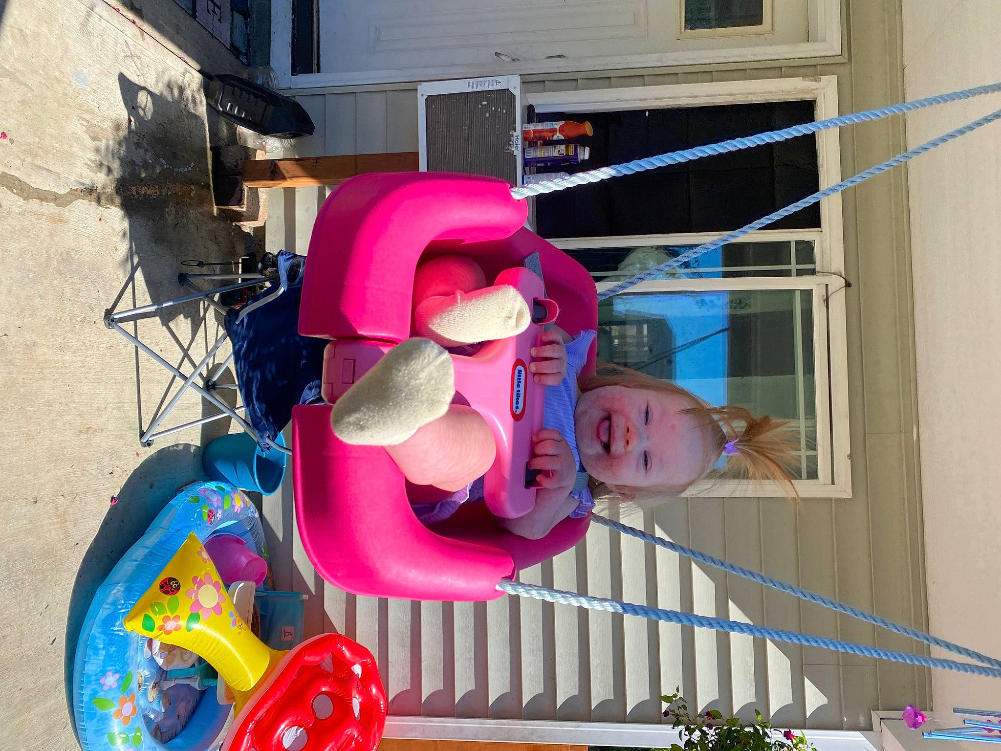 Mariah joined the competition — help win amazing prizes! child, costume, facade, fun, hat, house, joy, leisure, magenta, person, plant, tire, toddler, wheel, window