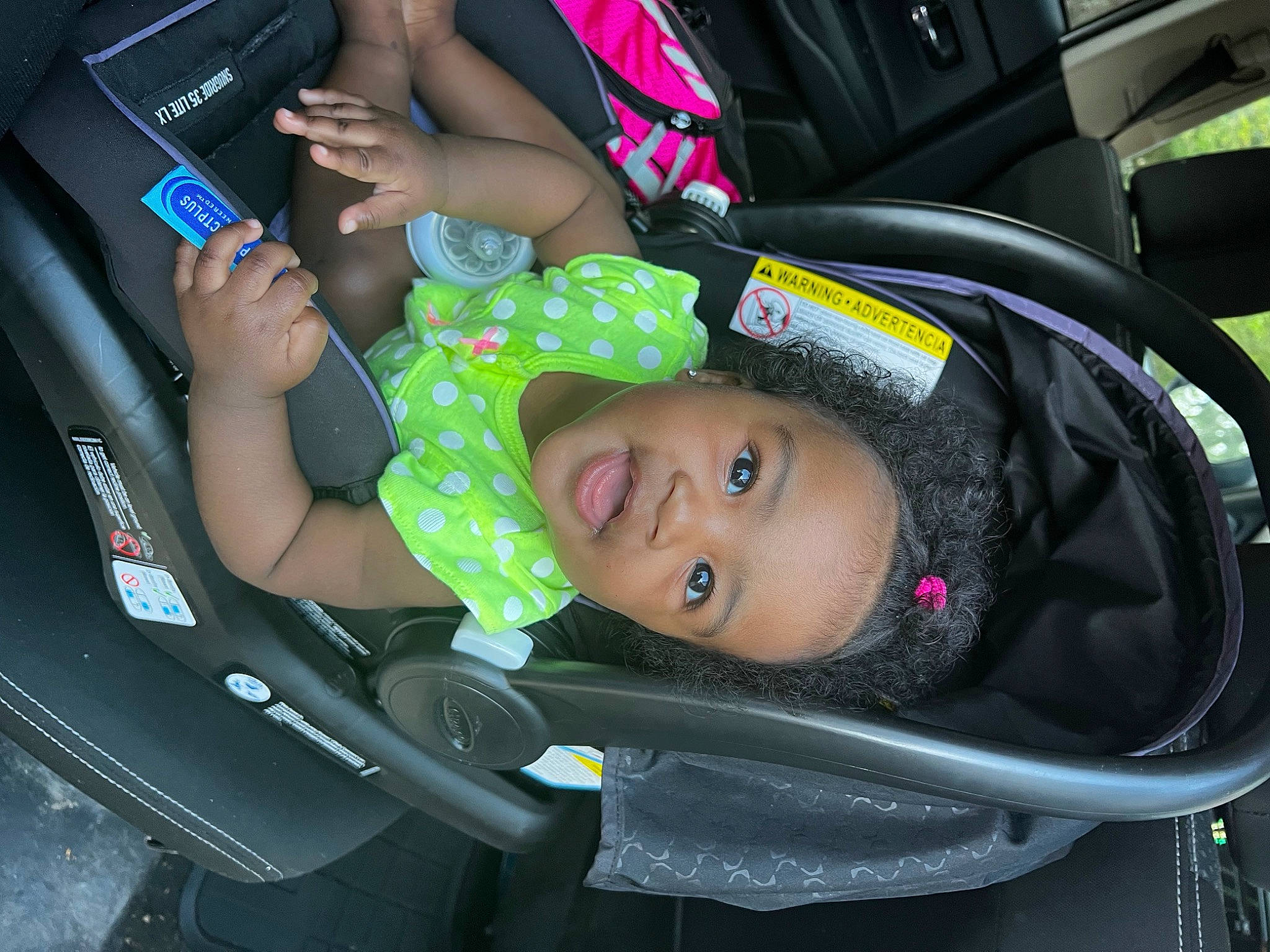 Aiyana is registered to the contest to win money with this photo: auto_part, automotive_design, automotive_exterior, baby, baby_carriage, baby_products, car, car_seat, car_seat_cover, child, comfort, family_car, motor_vehicle, person, product, seat_belt, smile, steering_part, thigh, toddler