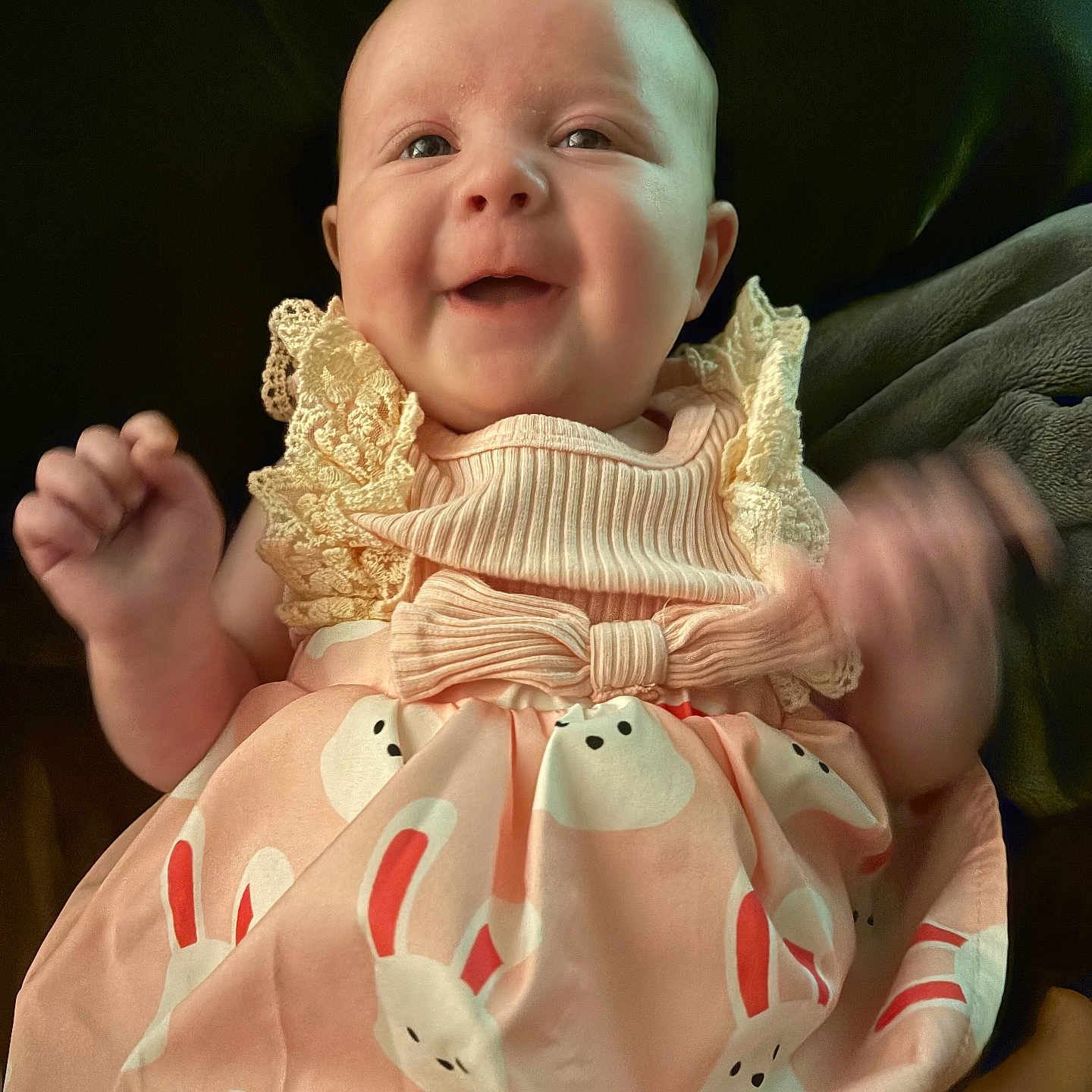 Angela joined the competition — help win amazing prizes! applique, baby, bodypart, bonnet, clothing, couch, dress, face, finger, furniture, hand, happy, hat, head, newborn, person, photography, portrait, sitting, smile