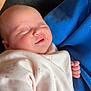 Maisie joined the competition — help win amazing prizes! baby, infant, smiling, sleeping, face, clothing, pink, blue, hand, skin, newborn, cute, comfort, texture, fabric, portrait, resting, peaceful, closeup, soft