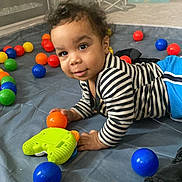 Amir joined the competition — help win amazing prizes! baby, ball, balloon, boy, child, crawling, face, football, head, indoors, male, person, photography, playarea, portrait, soccer, soccerball, sphere, sport, toy