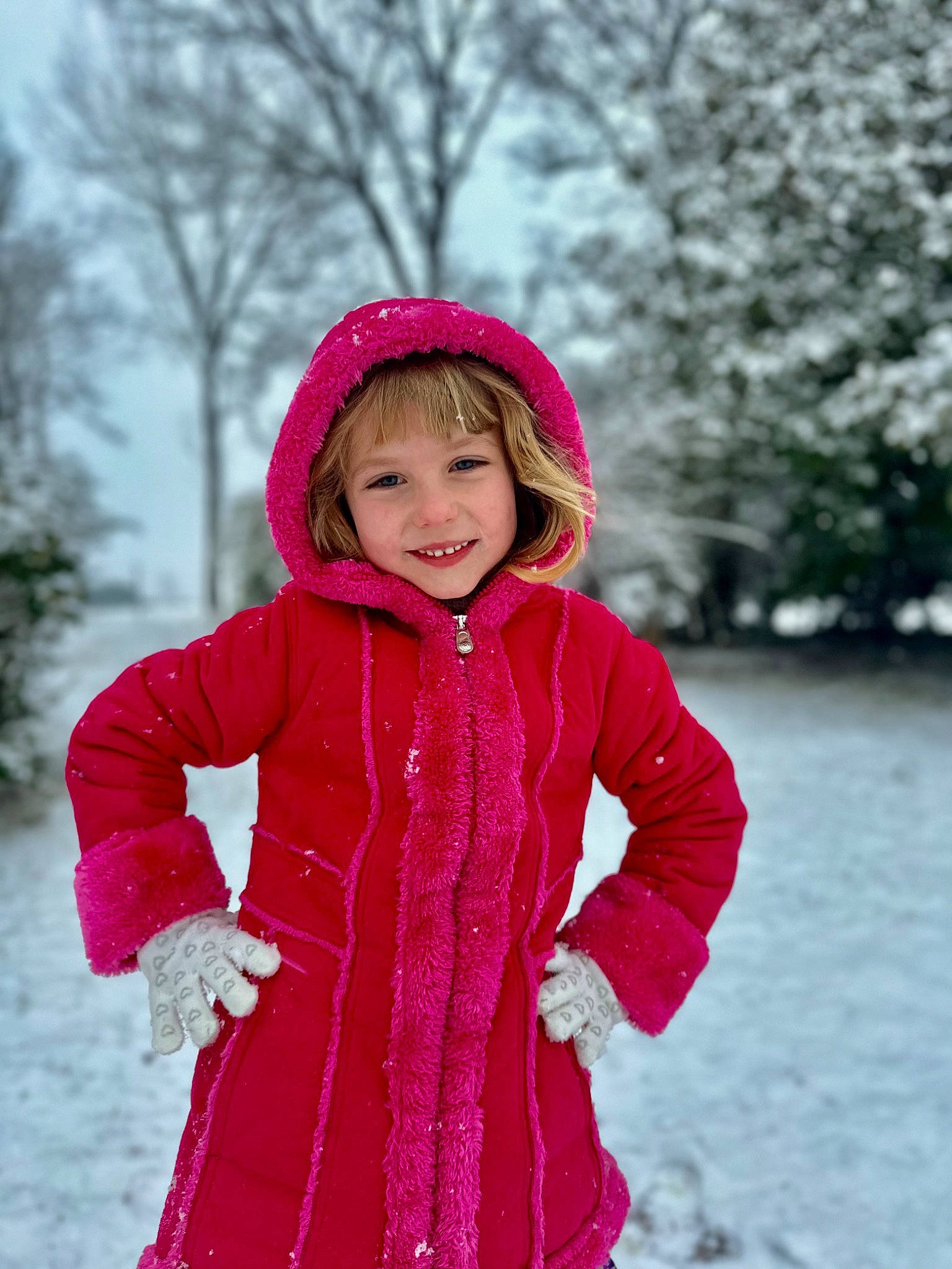Rio is registered to the contest to win money with this photo: beauty, cap, dress, eye, face, freezing, happy, headgear, headwear, jacket, joy, magenta, outerwear, person, pink, purple, recreation, sleeve, smile, snow