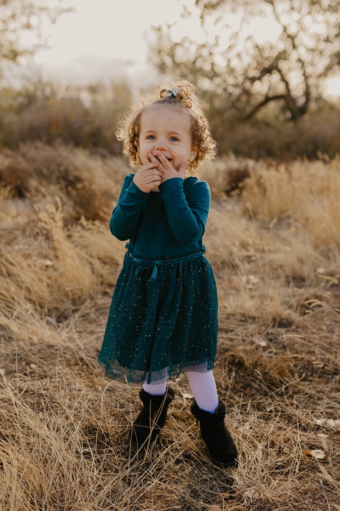 Sofia is registered to the contest to win money with this photo: blond, brown_hair, electric_blue, flash_photography, fun, grass, grassland, hair, happy, human_leg, knee, landscape, pattern, people_in_nature, person, plant, sleeve, toddler, tree, winter