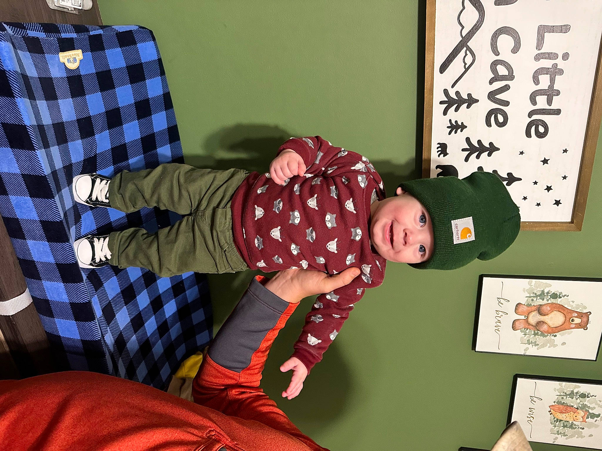 Alan joined the competition — help win amazing prizes! baby_toddler_clothing, card_game, child, comfort, hat, headwear, knee, linens, pattern, person, plaid, recreation, room, sitting, sleeve, sock, tartan, textile, toddler