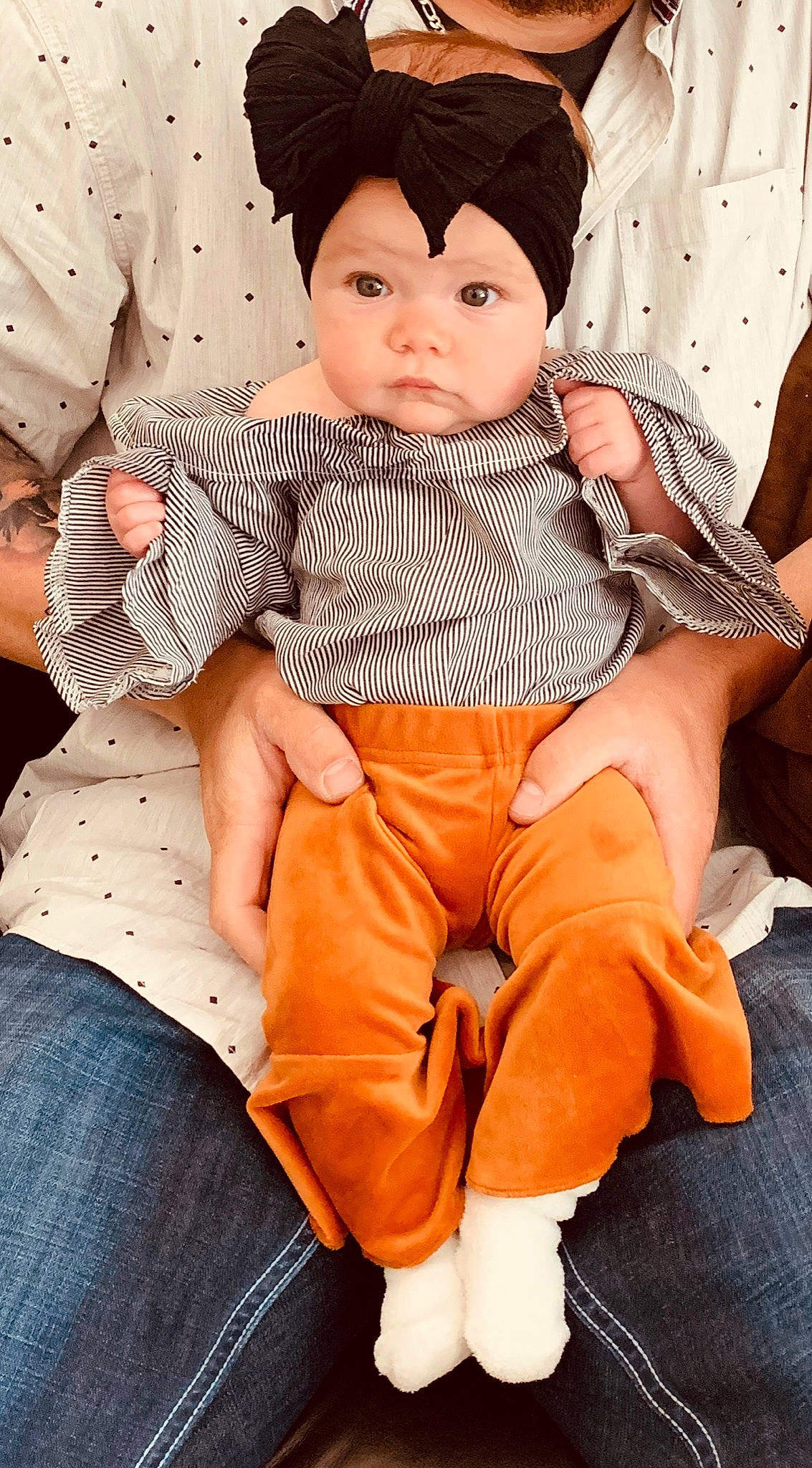 Kinnedy is registered to the contest to win money with this photo: baby, beanie, child, child_model, headgear, leg, person, sitting, sleeve, toddler