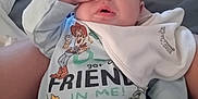 Serena joined the competition — help win amazing prizes! baby, infant, sleeping, onesie, bib, hand, bed, blanket, diaper, clothing, cute, person, indoors, soft_lighting, toy_story, cartoon, face, nose, expression, cozy