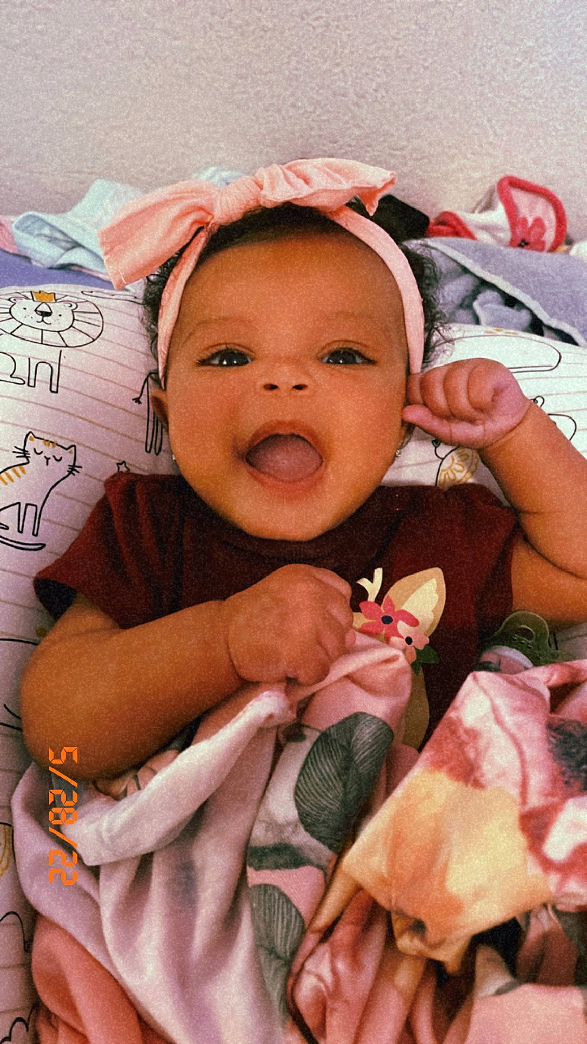 Alayiah joined the competition — help win amazing prizes! baby, cheek, child, eye, face, facial_expression, gesture, happy, head, headgear, human, lip, mouth, nose, person, pink, product, skin, smile, textile