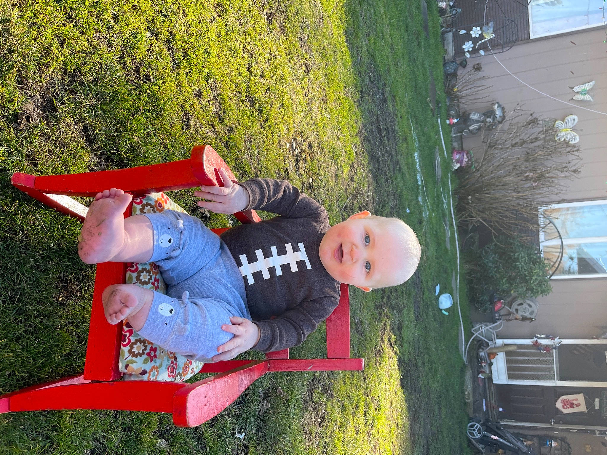 Gunnar joined the competition — help win amazing prizes! child, fun, grass, green, hat, house, landscape, lawn, leisure, outdoor_play_equipment, people_in_nature, person, plant, play, recreation, shrub, slope, toddler, tree, truck