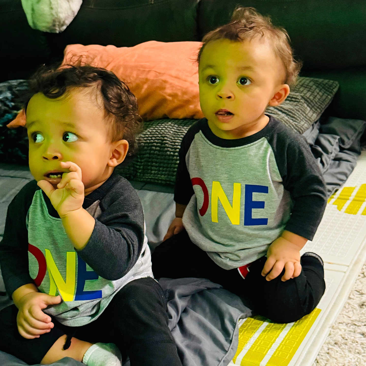 Zale Wahome joined the competition — help win amazing prizes! architecture, baby, bodypart, building, clothing, couch, cushion, face, finger, furniture, hand, head, homedecor, indoors, livingroom, pants, person, photography, portrait, t_shirt