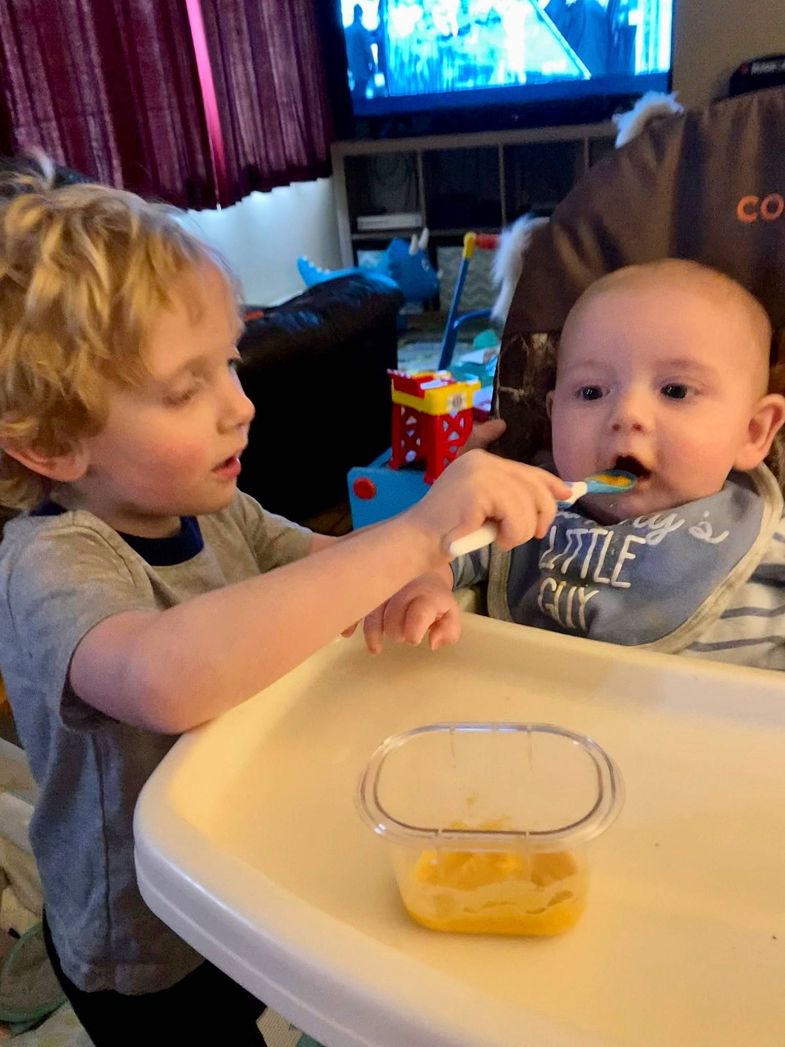 Abel joined the competition — help win amazing prizes! baby, chair, child, couch, curtain, drinkware, event, food, fun, head, person, plate, play, room, sharing, sitting, t_shirt, table, tableware, television