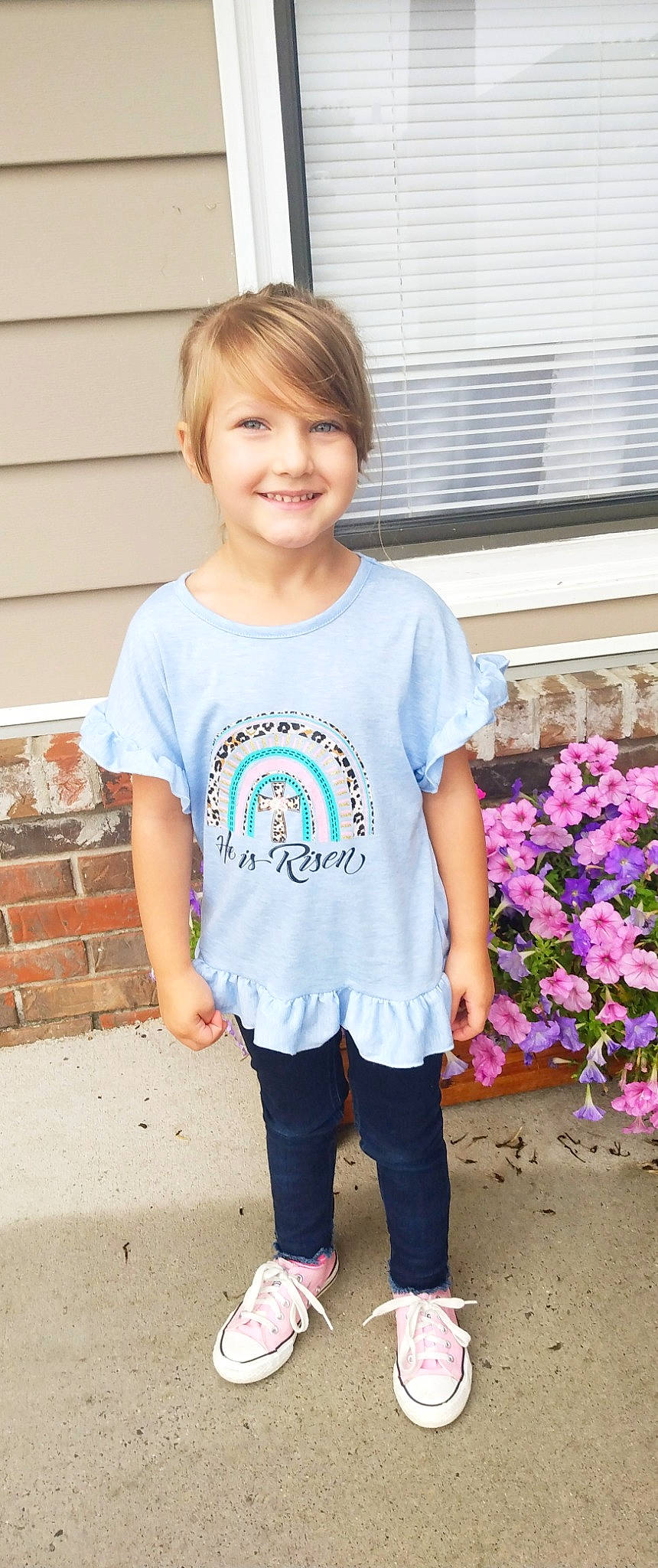 Paisleigh is registered to the contest to win money with this photo: child, chin, clothing, cool, electric_blue, flower, hair, happy, head, joy, magenta, person, petal, pink, plant, sleeve, smile, sportswear, t_shirt, toddler