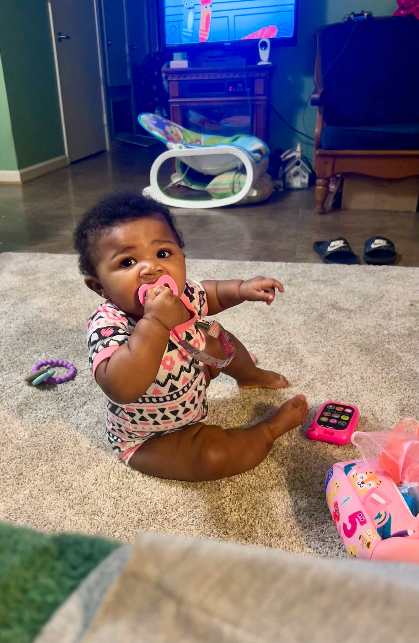 Diamond is registered to the contest to win money with this photo: baby, baby_toddler_clothing, blue, child, door, event, flooring, foot, fun, happy, human_leg, leisure, person, play, recreation, room, sitting, television, thigh, toddler