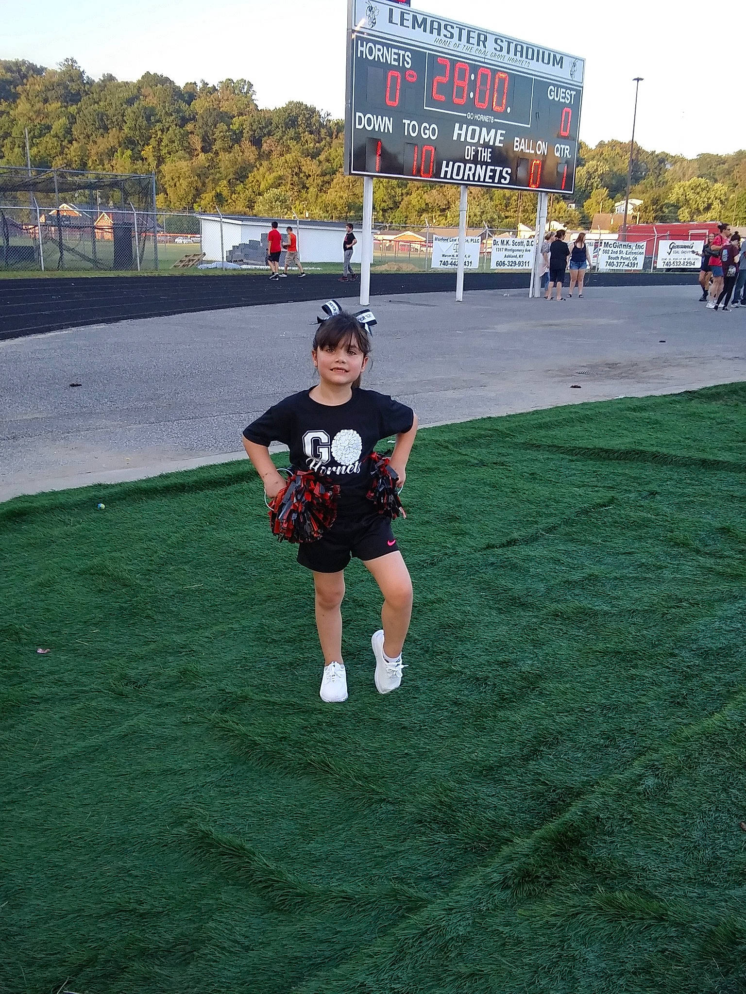 Aubree is registered to the contest to win money with this photo: fun, games, grass, person, plant, player, recreation, running, sport_venue, sports, stadium, team