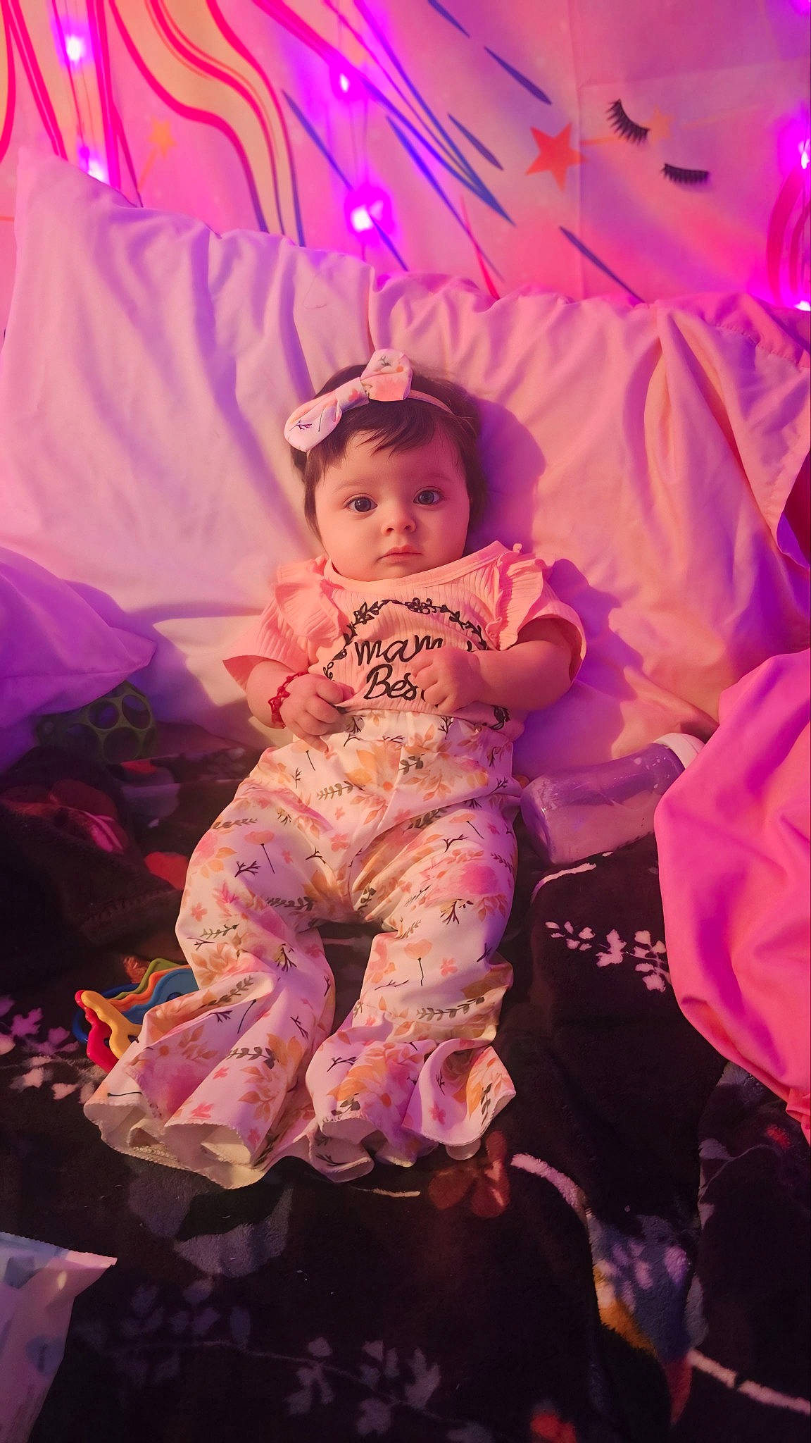 Journei Aliviah joined the competition — help win amazing prizes! baby, child, costume, entertainment, event, fashion_accessory, fun, happy, human_body, leisure, magenta, peach, performing_arts, person, pink, purple, sandal, sitting, toddler, tradition