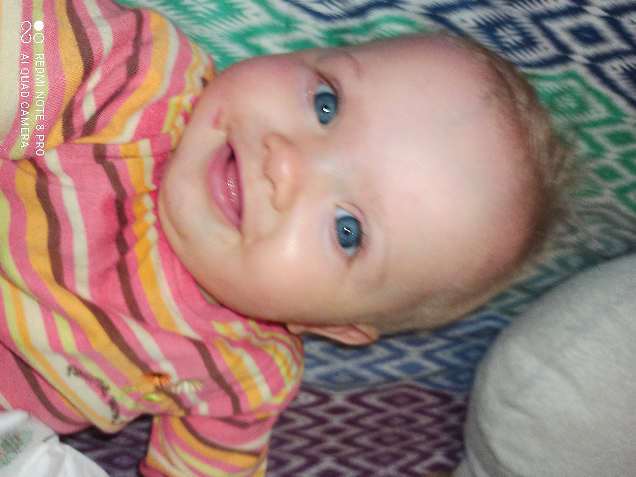 Léa participe au concours pour gagner de l'argent avec cette photo : baby, baby_toddler_clothing, cheek, child, chin, eye, eyebrow, eyelash, forehead, fun, happy, human_body, iris, joy, lip, mouth, nose, pattern, person, skin