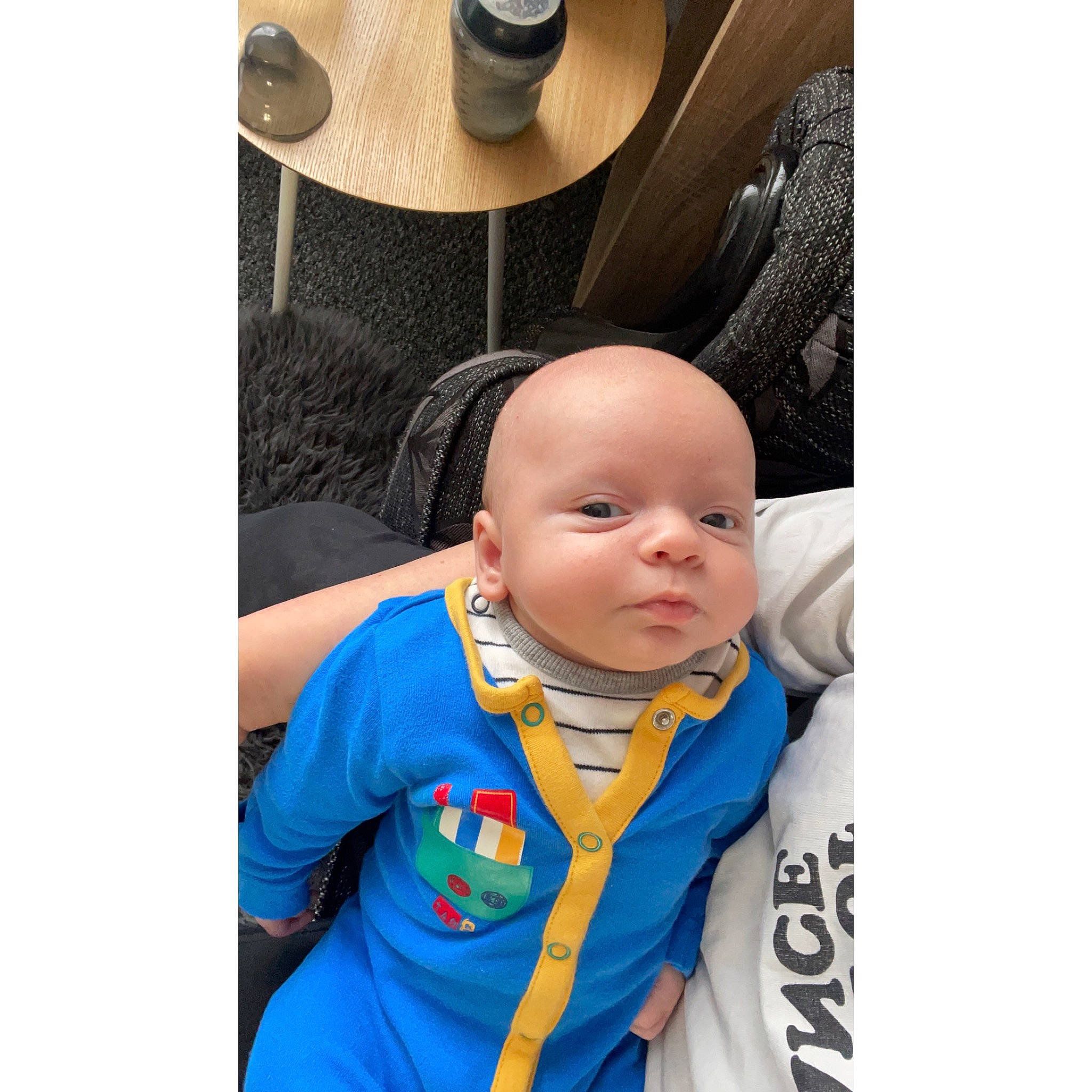 Toby is registered to the contest to win money with this photo: baby, baby_products, baby_toddler_clothing, car_seat, chair, child, comfort, electric_blue, fashion_accessory, fedora, happy, hat, metal, outerwear, person, product, selfie, sitting, sleeve, t_shirt