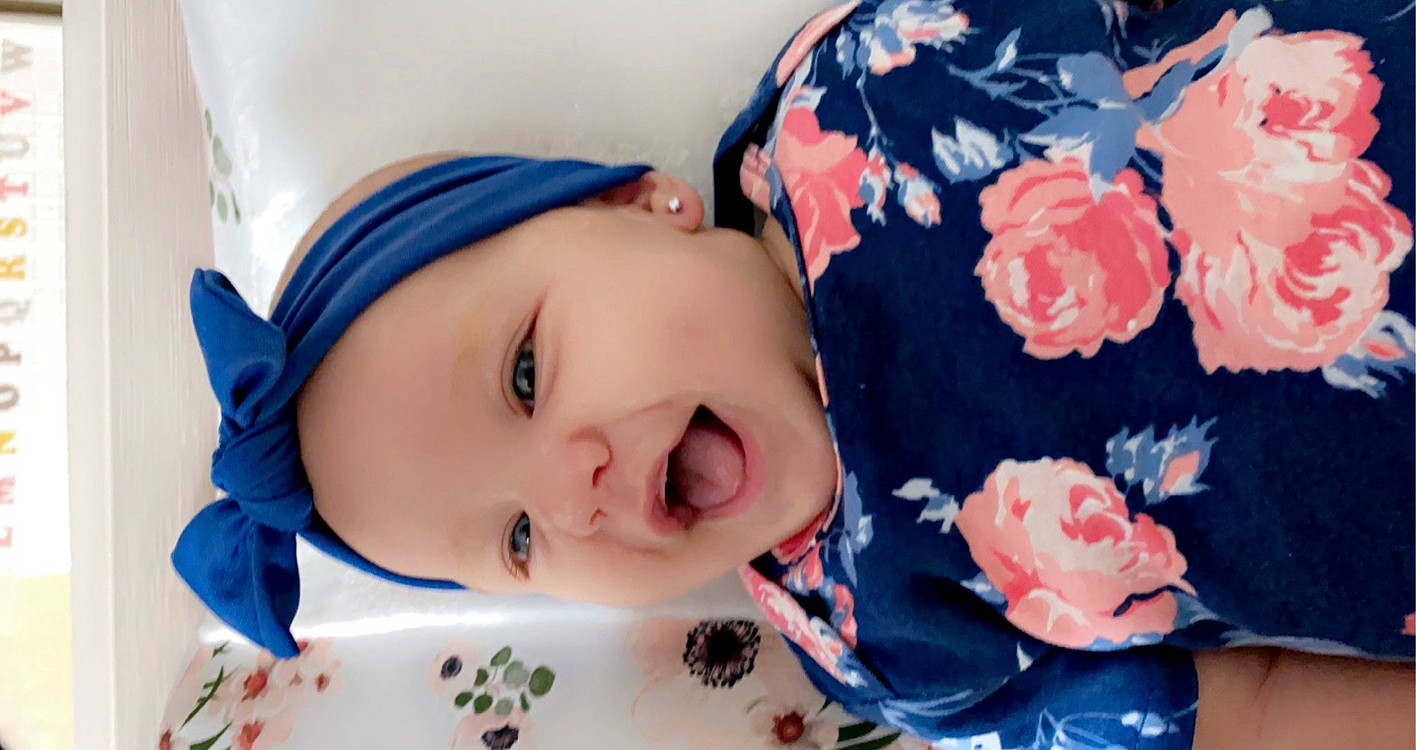Bristol joined the competition — help win amazing prizes! baby, baby_toddler_clothing, cheek, child, close_up, eyelash, face, happy, headgear, headwear, lip, neck, nose, pattern, person, pink, rose, skin, sleeve, textile