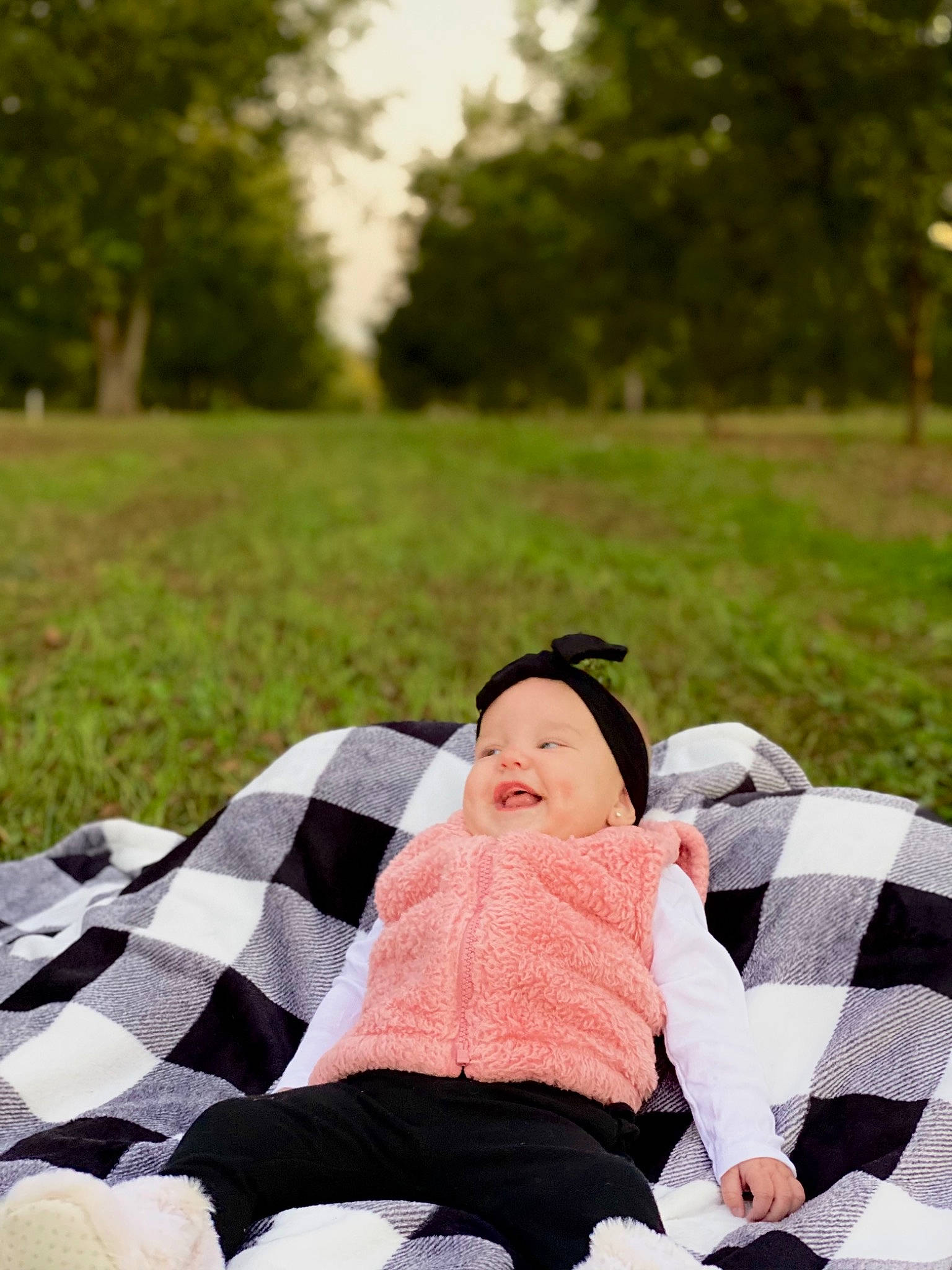 Bristol joined the competition — help win amazing prizes! baby, child, comfort, fun, grass, grassland, happy, headwear, lap, lawn, leisure, pattern, people_in_nature, person, plaid, plant, recreation, sitting, spring, tartan