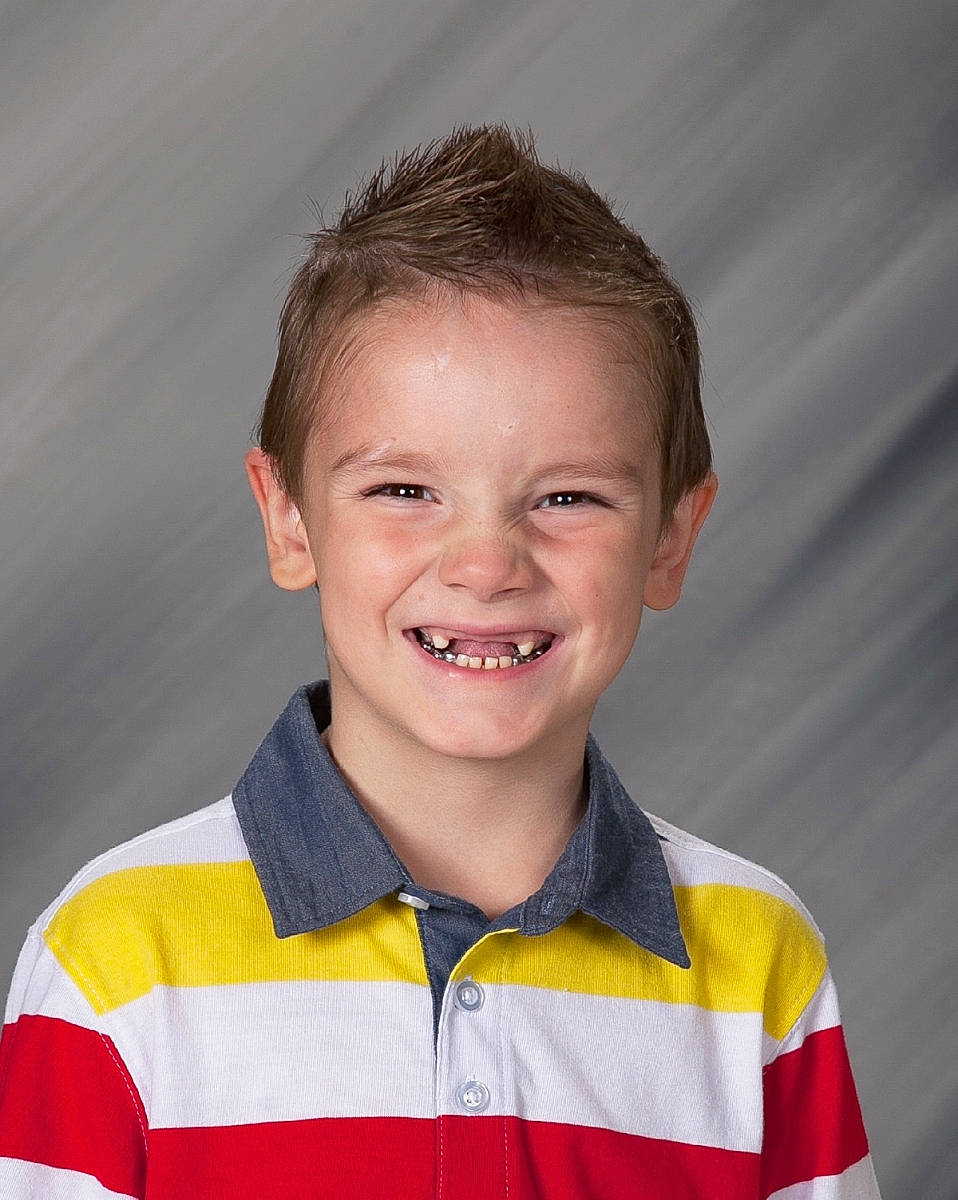 Ashton is registered to the contest to win money with this photo: child, child_model, chin, face, facial_expression, forehead, fun, happy, joy, person, polo_shirt, smile