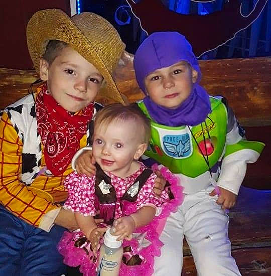 Ashton is registered to the contest to win money with this photo: child, cool, costume, event, family, fashion_accessory, happy, hat, headgear, headwear, joy, people, person, plant, sibling, smile, toddler, vacation