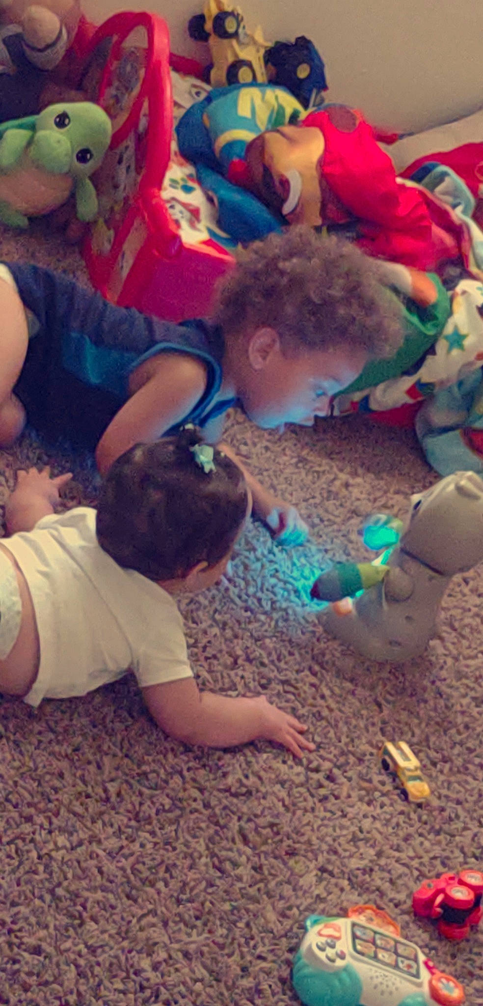 Kaylee joined the competition — help win amazing prizes! adaptation, baby, child, cool, event, flooring, fun, grass, happy, leisure, person, play, recreation, sand, shorts, sitting, soil, t_shirt, toddler, toy