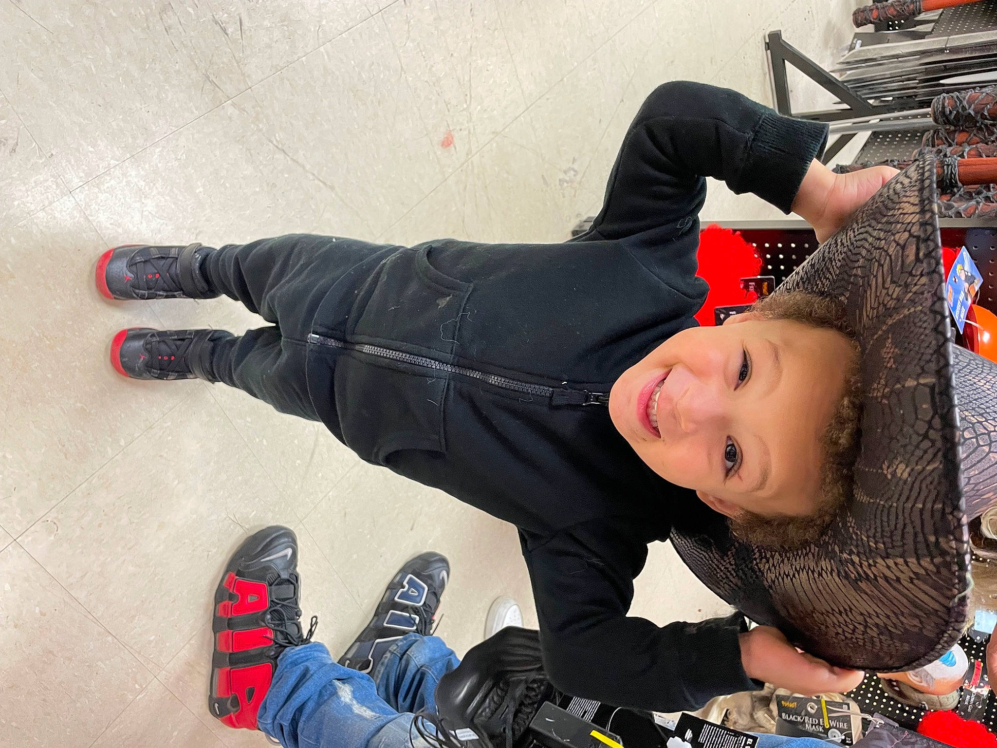 Khalil joined the competition — help win amazing prizes! child, flash_photography, foot, fun, glove, happy, human_leg, joy, knee, outdoor_shoe, person, personal_protective_equipment, recreation, shoe, sitting, smile, sneakers, sock, sportswear, thigh